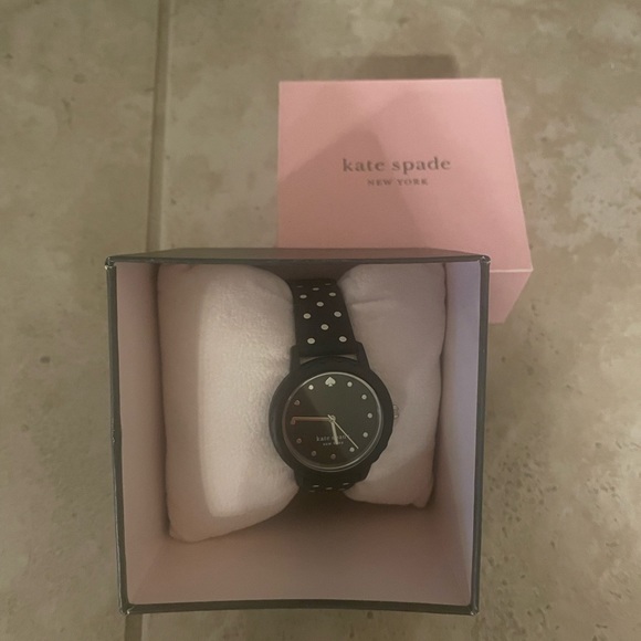 Kate Spade black and white polka dot watch.